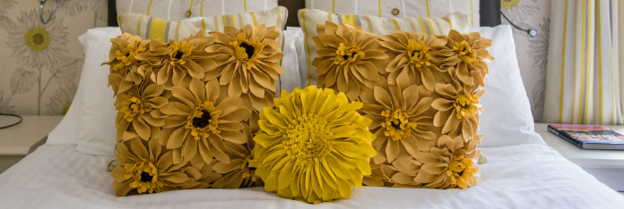 Yellow Cushions on Bed in Double En Suite