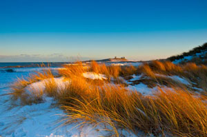 Dunstanburgh Castle in Snow